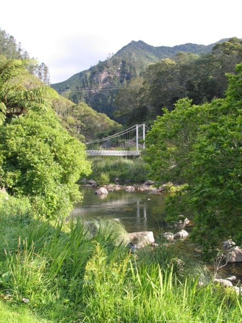 Crossover the Ohinemuri River by using the Karangahake Gorge foot bridge. Hauraki District, North Island, New Zealand